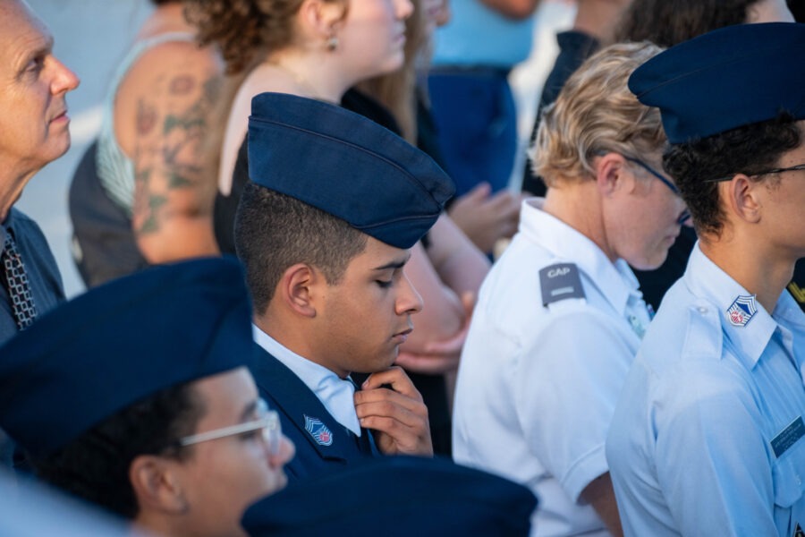 a group of people standing next to each other