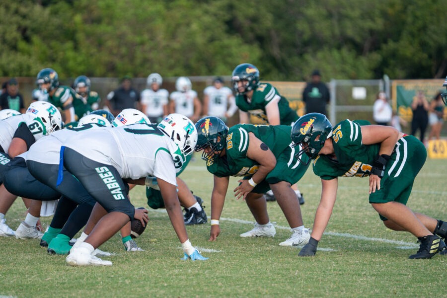 a group of young men playing a game of football