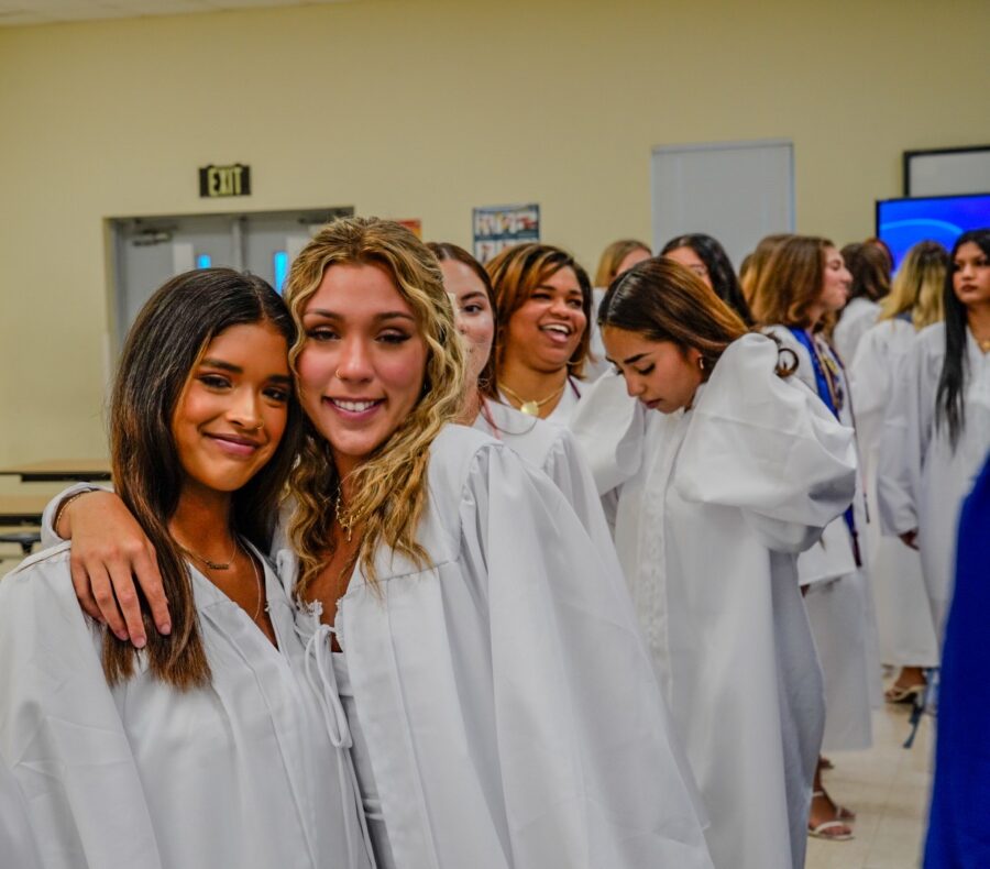 a group of young women standing next to each other