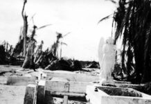 a black and white photo of a cemetery