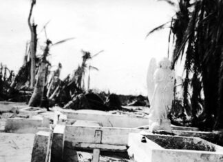 a black and white photo of a cemetery