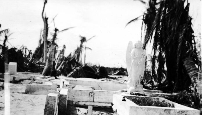a black and white photo of a cemetery