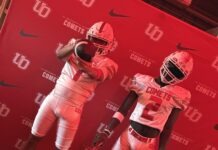 the uniforms of the football team on display