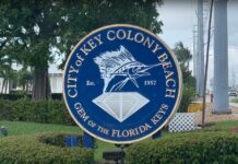 a sign for the city of key colony beach