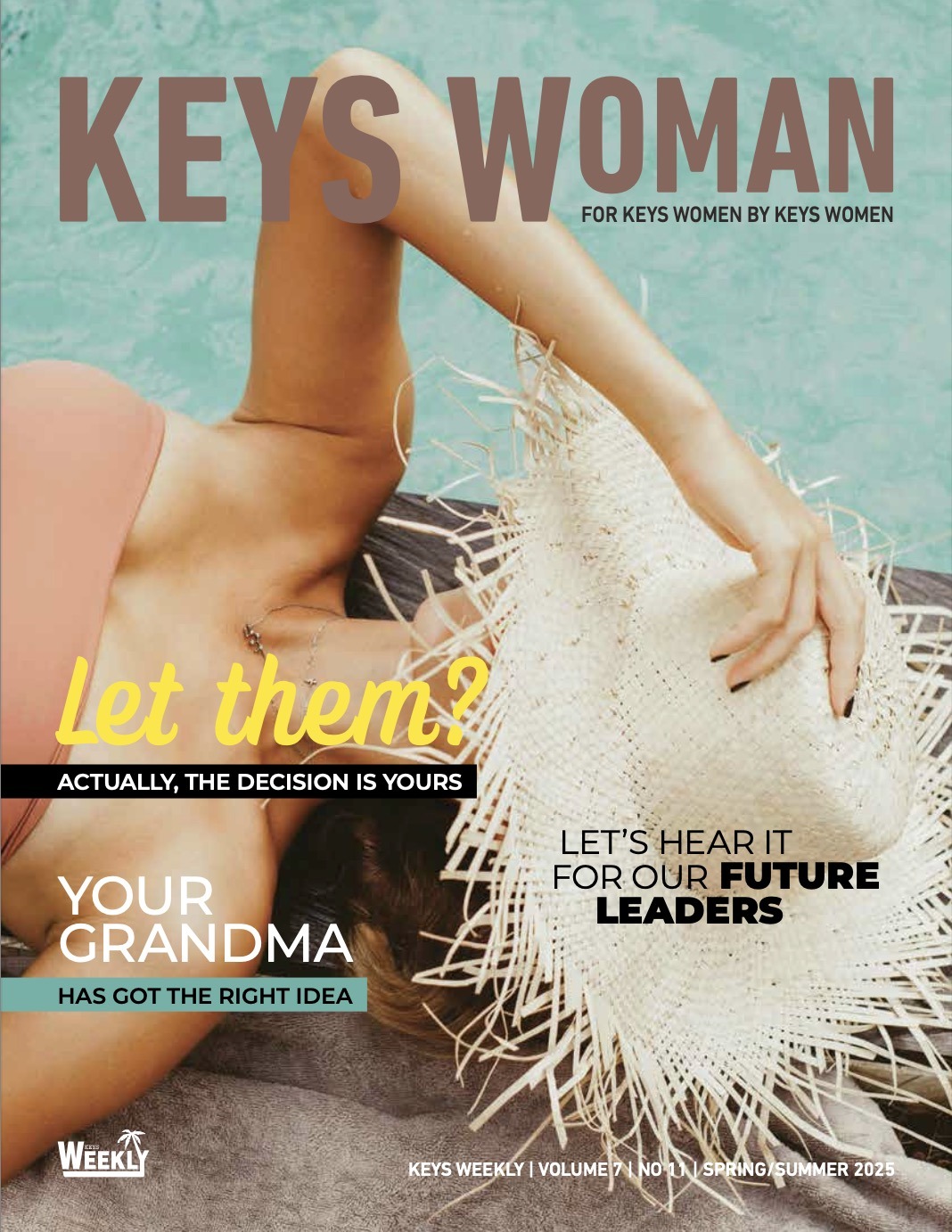 a woman laying on top of a magazine cover