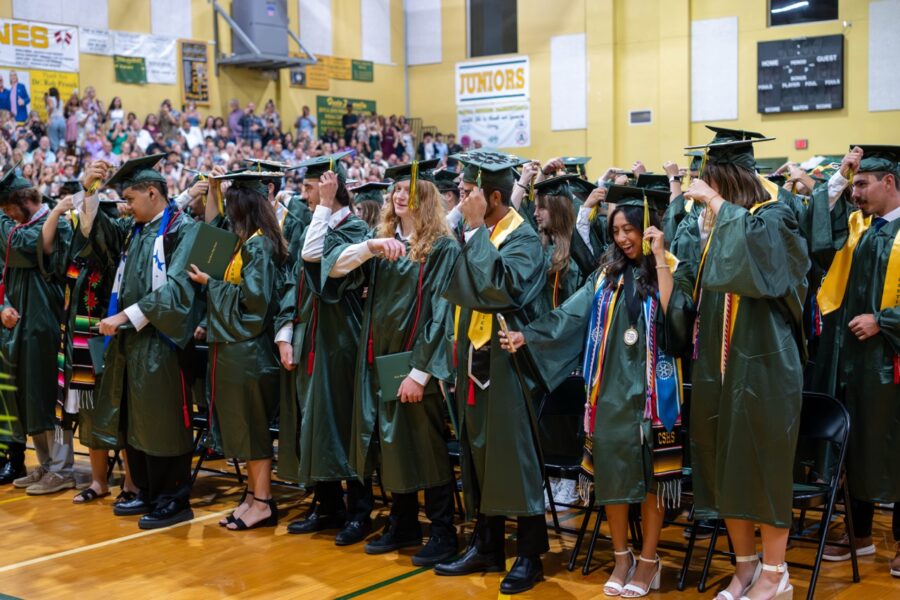 a large group of people in graduation gowns