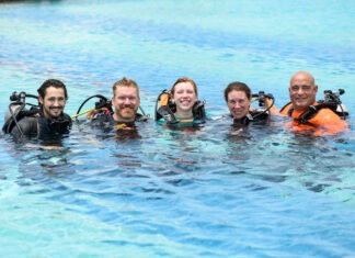 KEY WEST TO HOST SPECIAL OPERATIONS SERVICEMEMBERS & THEIR FAMILIES a group of people in the water with scuba gear