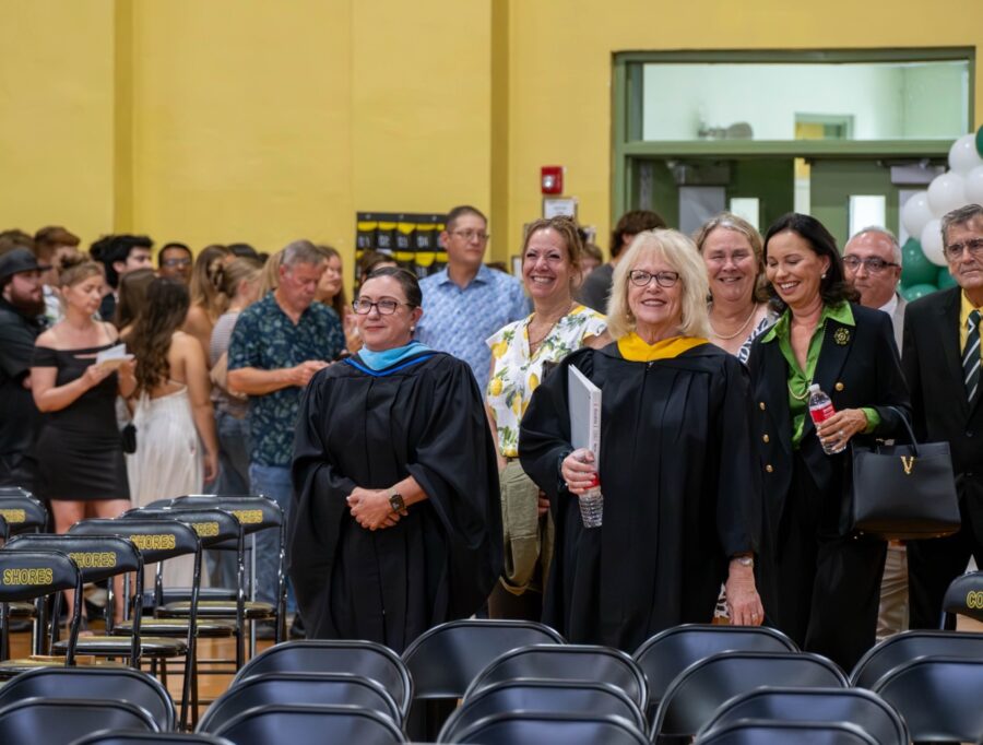 a group of people standing next to each other