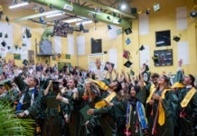a large group of people in graduation gowns