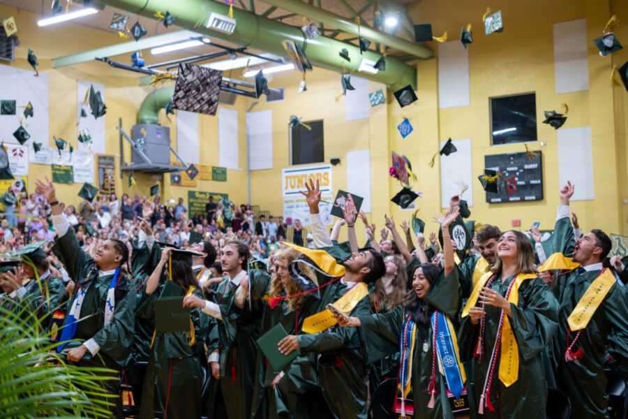 a large group of people in graduation gowns