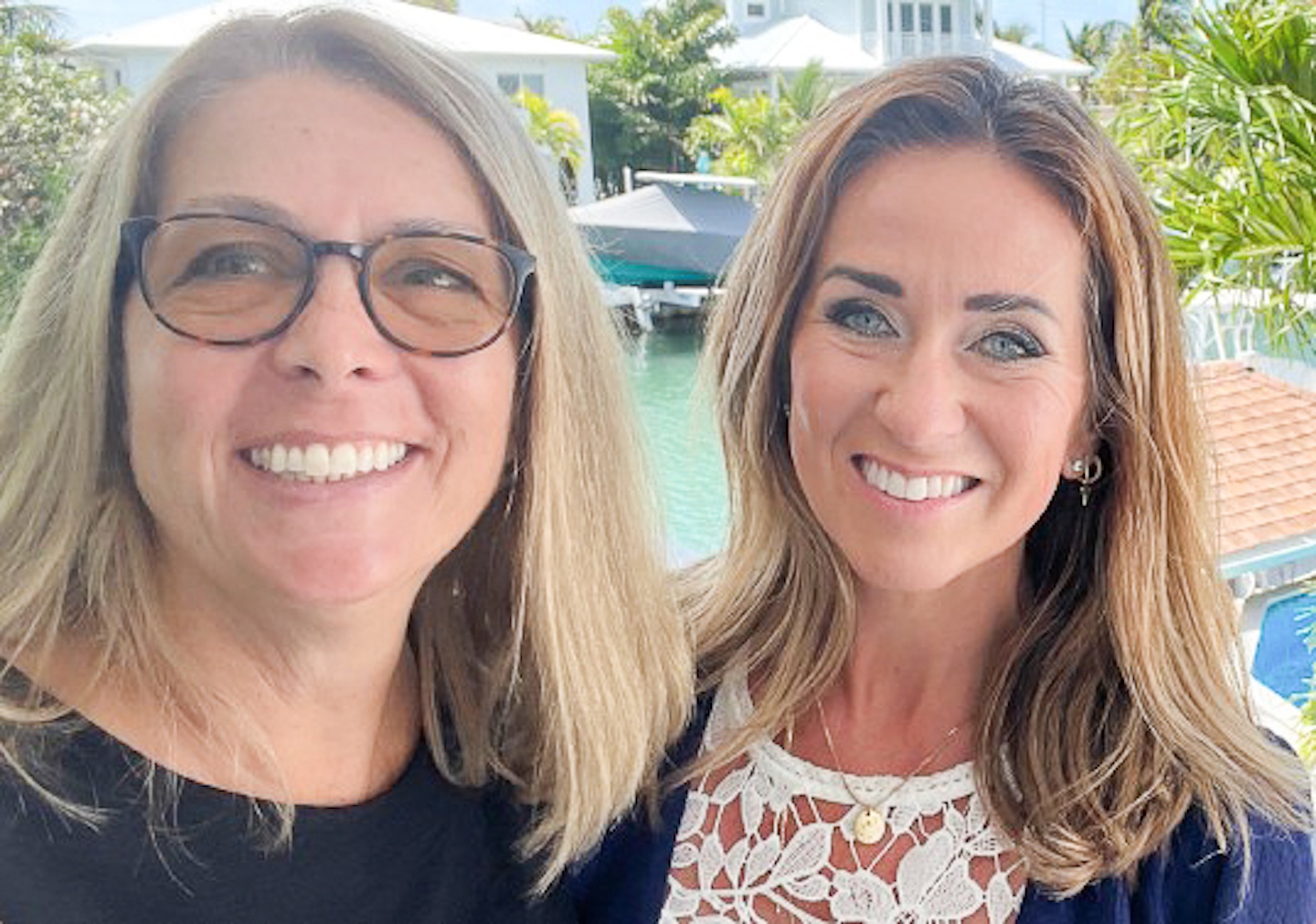 a couple of women standing next to each other