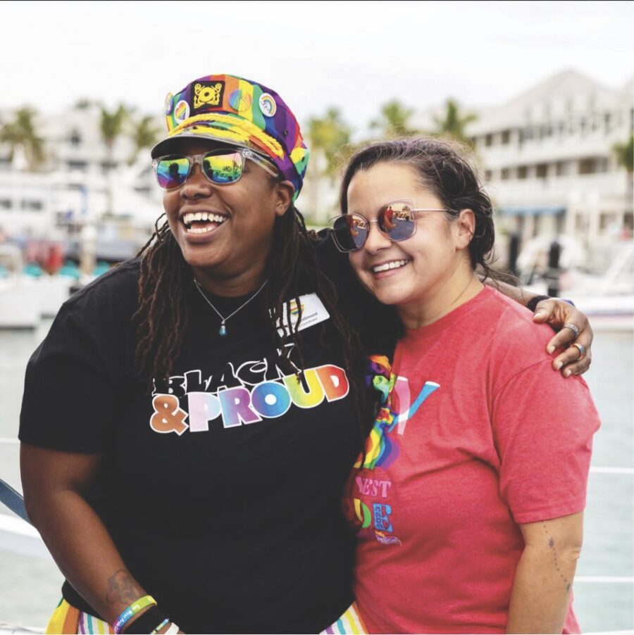 a couple of women standing next to each other