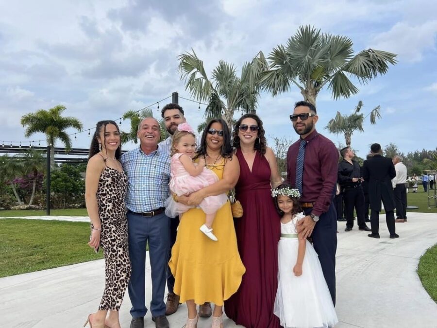 a group of people standing next to each other