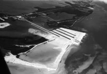 a black and white photo of an airplane wing