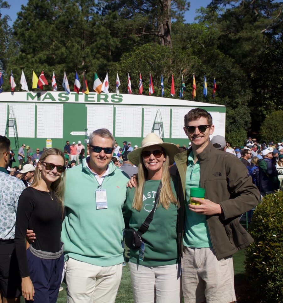 a group of people standing next to each other