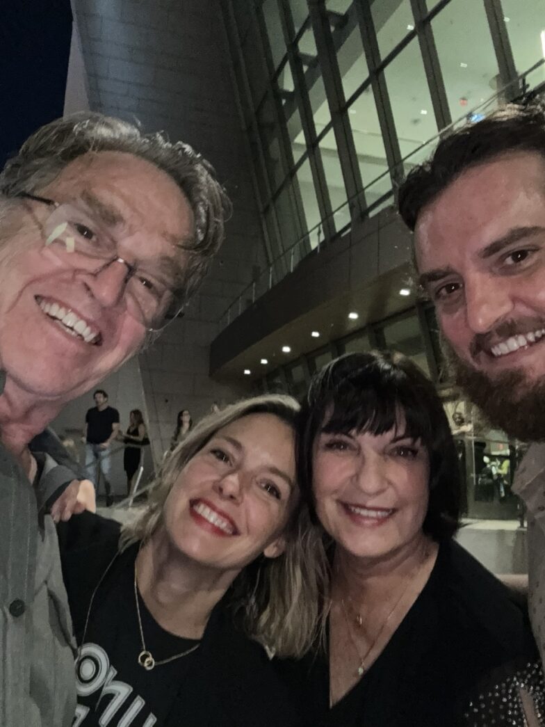 a group of people standing next to each other