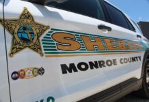 a sheriff car parked in a parking lot