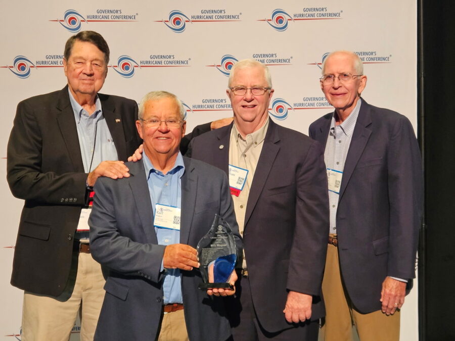 a group of men standing next to each other