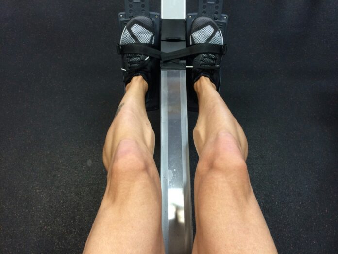 a person on a treadmill with their feet on the treadmill
