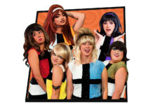 a group of women standing next to each other