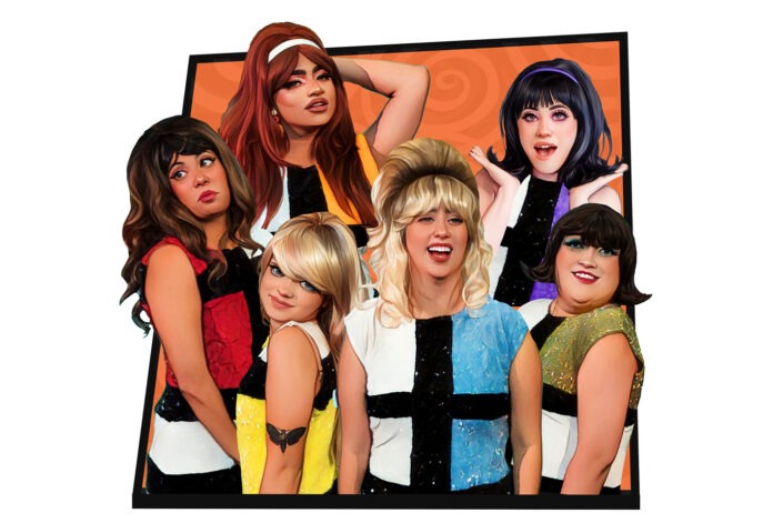 a group of women standing next to each other