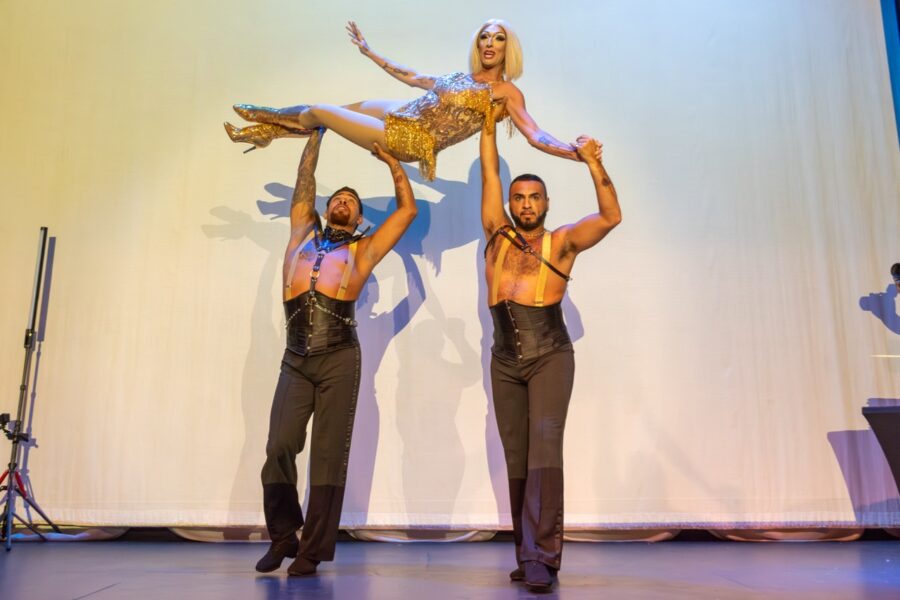 a couple of people that are standing on a stage