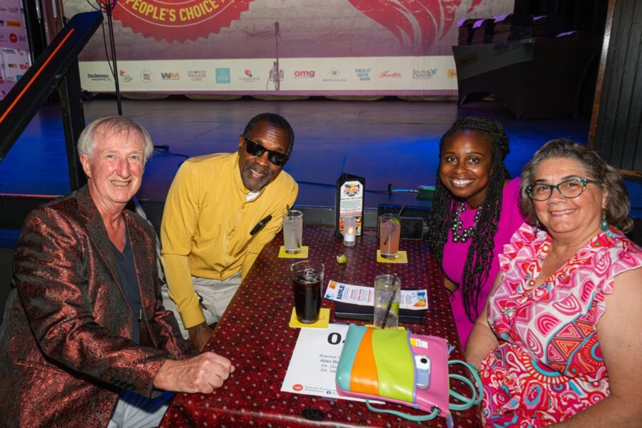 a group of people sitting at a table