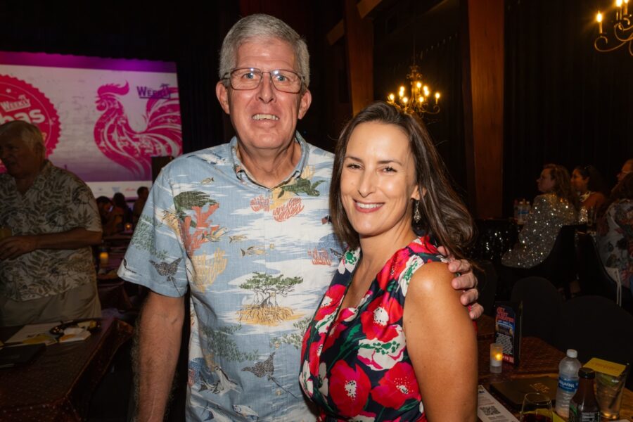 a man and a woman standing next to each other