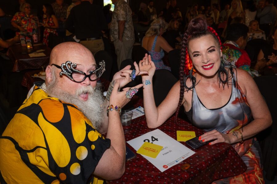 a man and a woman sitting at a table