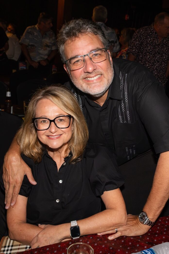 a man and a woman sitting at a table
