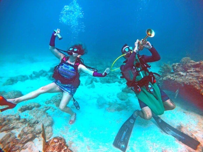 DCIM100GOPROGOPR2055.JPG a couple of people that are in the water