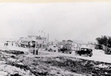 an old black and white photo of a town