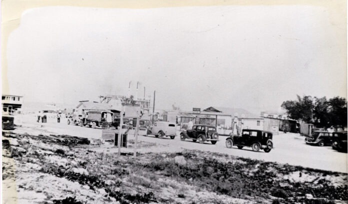 an old black and white photo of a town
