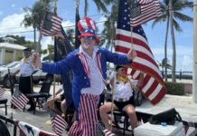 a man in a patriotic outfit standing on a stage