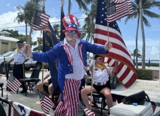a man in a patriotic outfit standing on a stage