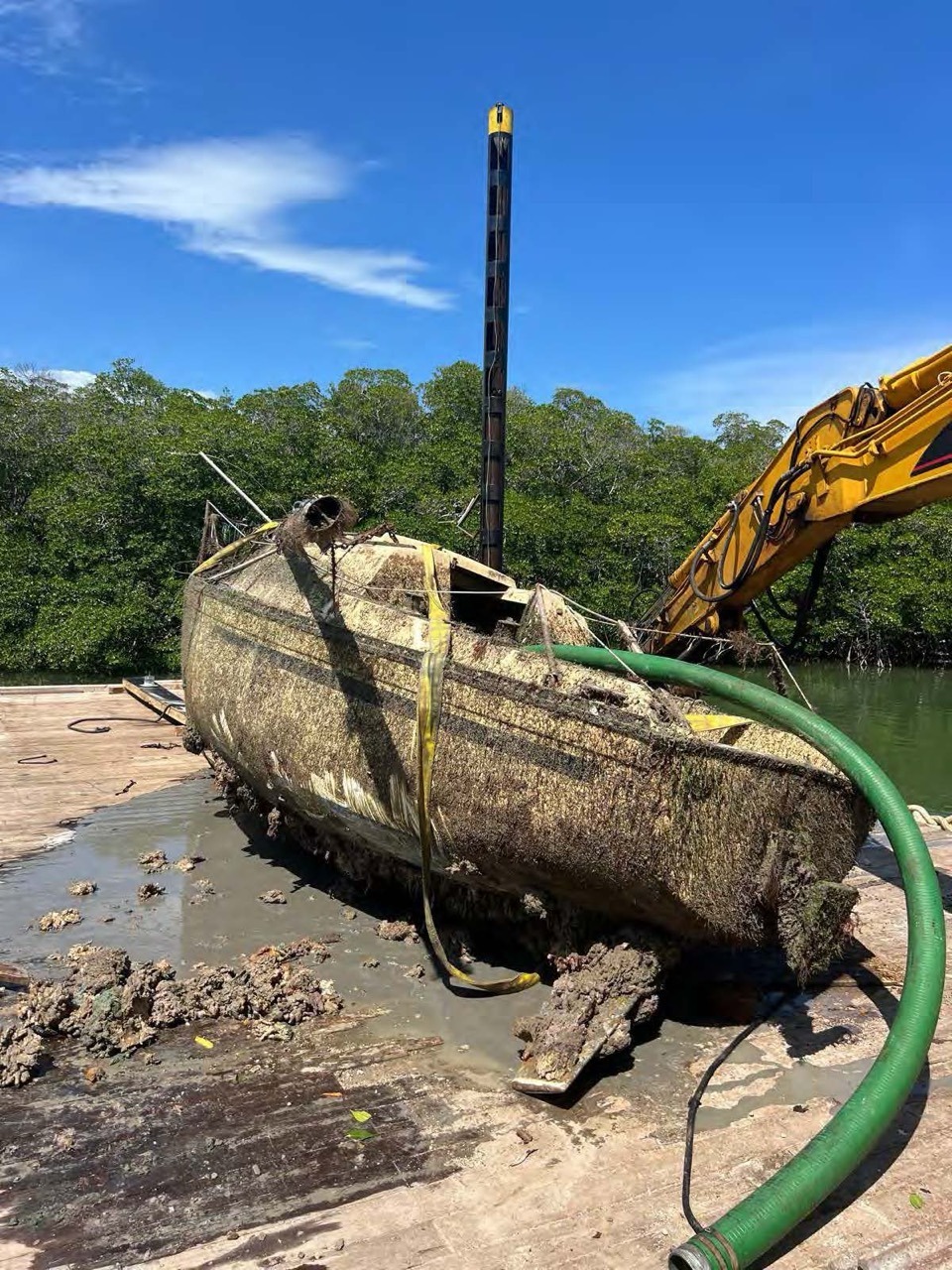 a boat that is sitting in the mud
