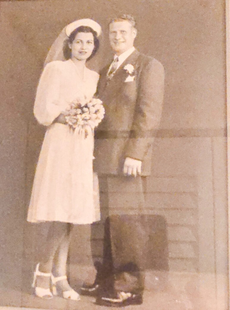 a man and a woman standing next to each other