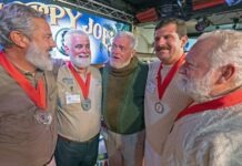 a group of men standing next to each other