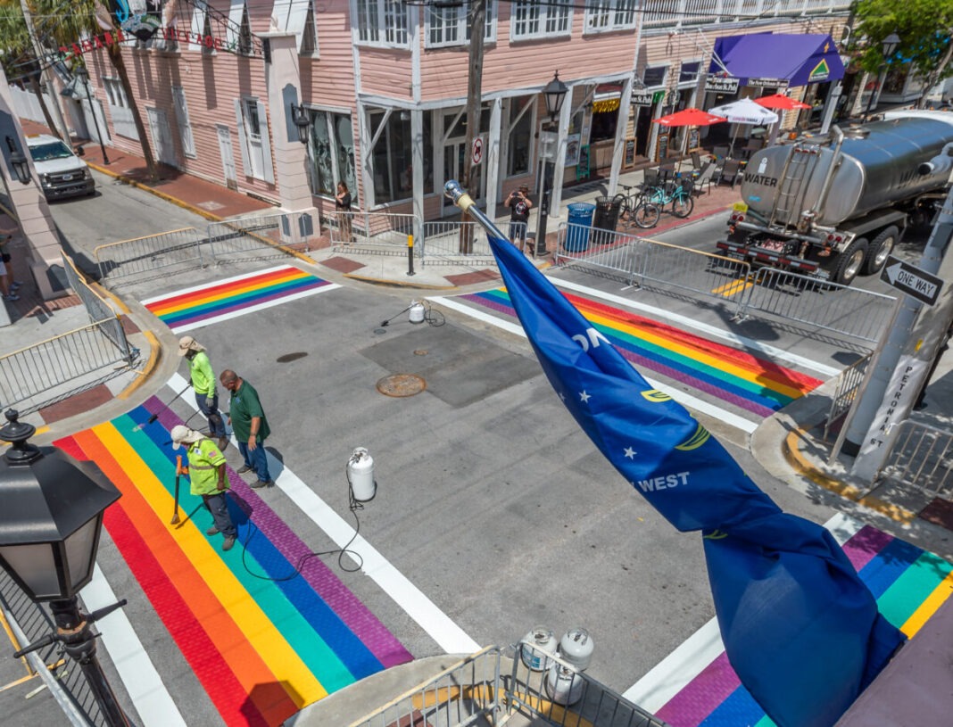 an aerial view of a rainbow painted street