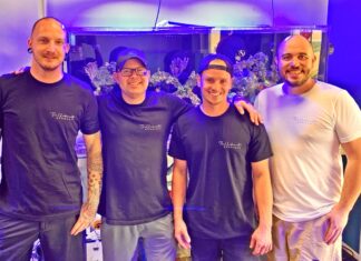 a group of men standing next to each other