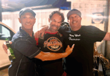 a group of men standing next to each other
