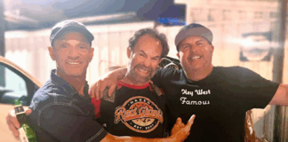 a group of men standing next to each other