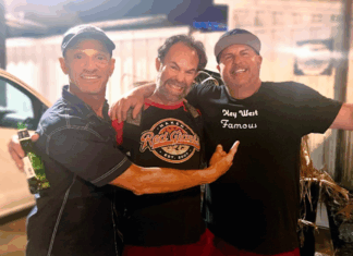 a group of men standing next to each other