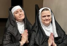 a couple of women standing next to each other