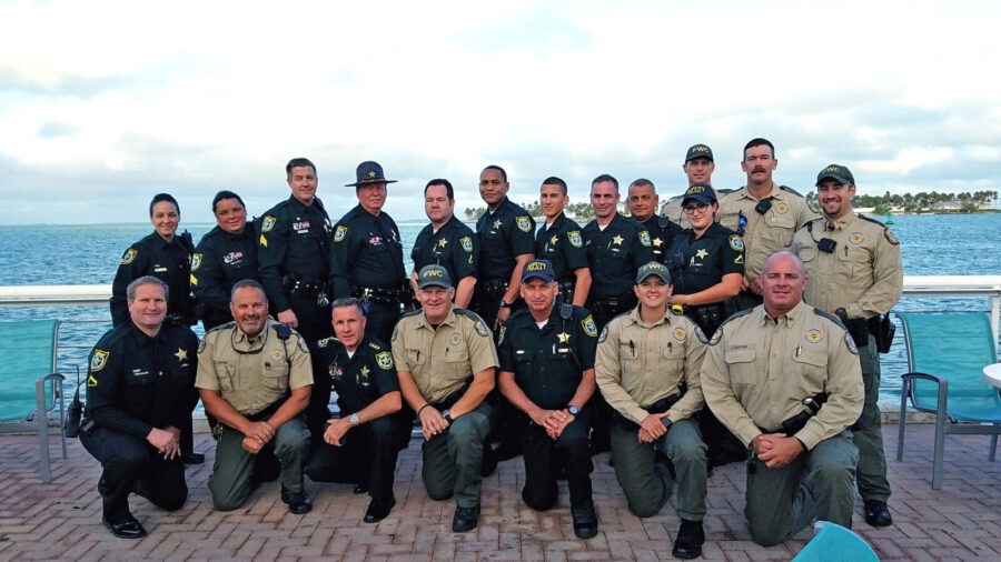 a group of police officers posing for a picture