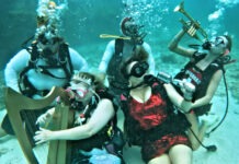 a group of people that are under water