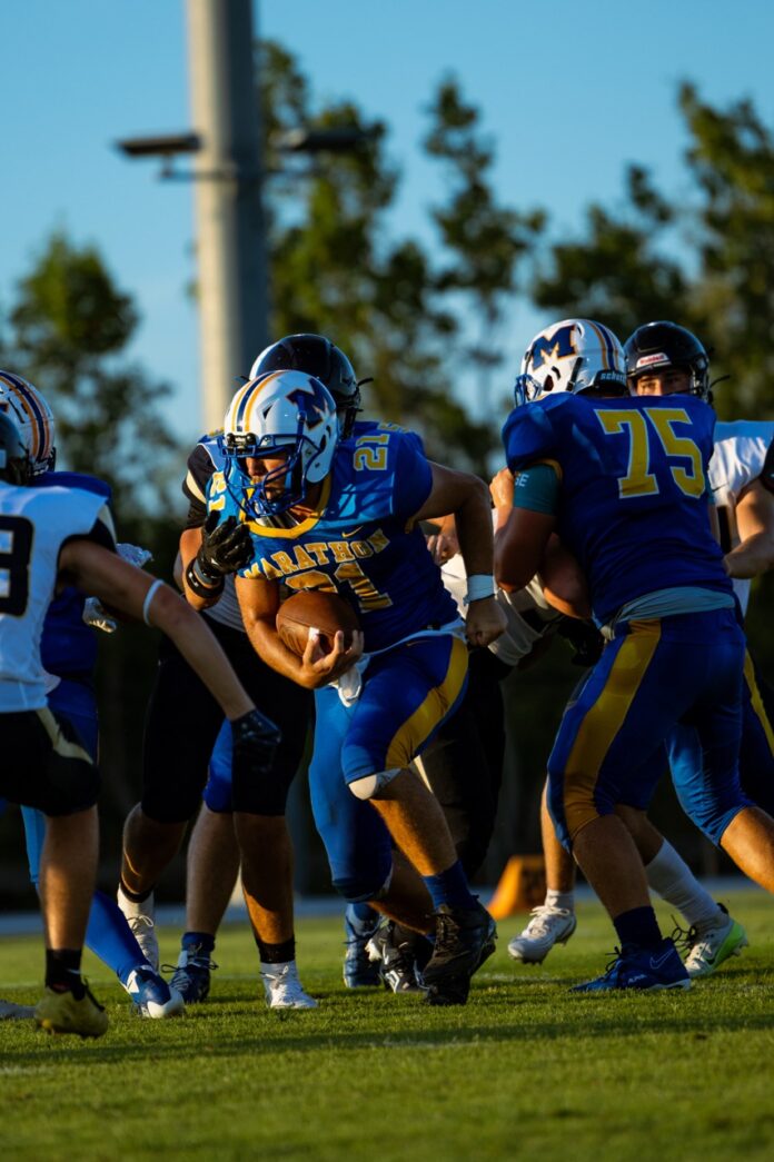 a group of football players on a field
