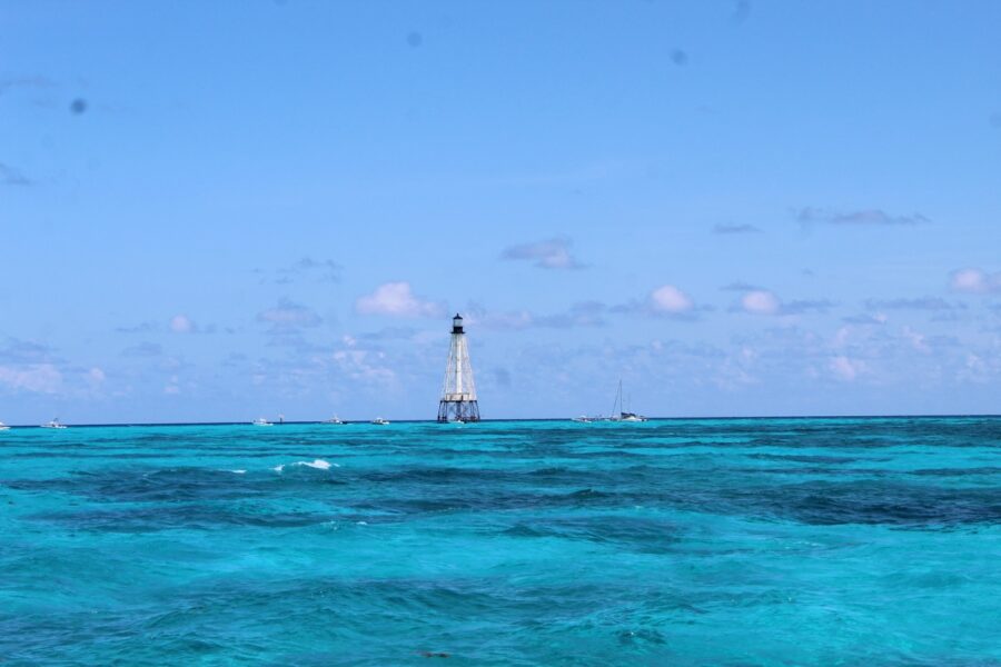 a light house in the middle of the ocean