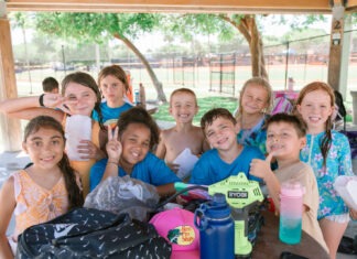 a group of children posing for a picture