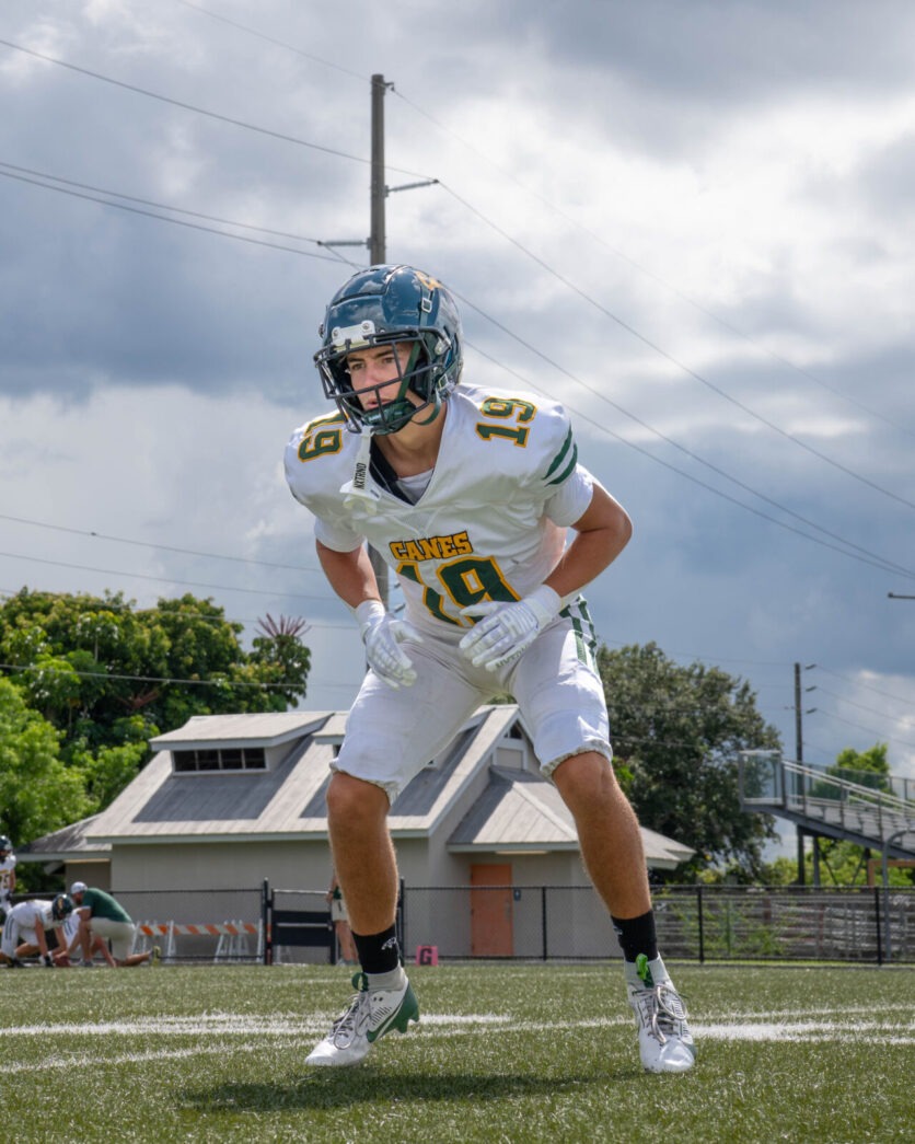 a football player is running on the field